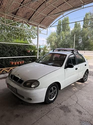 Унаа: Daewoo Lanos: 1997 г., 1.5 л, Кол менен иштөөчү, Бензин, Хетчбек — 1