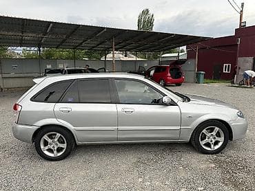 обмен на хариер: Mazda 323: 2001 г., 1.6 л, Механика, Бензин, Хэтчбэк — 4