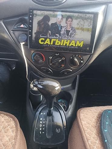 su 7: Ford Focus: 2003 г., 1.6 л, Автомат, Бензин, Универсал — 4