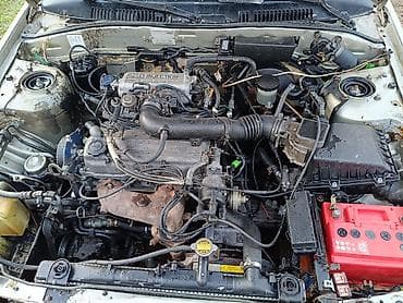 mazba 323: Mazda 626: 1989 г., Механика, Седан — 1