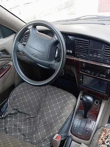 муссо 601: Daewoo Nubira: 2001 г., 1.5 л, Автомат, Бензин, Седан — 7