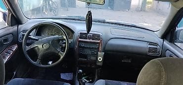 Продажа авто: Mazda Familia: 1999 г., 1.5 л, Механика, Бензин, Универсал — 6