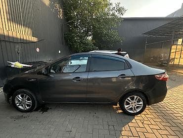 sonata for rent: Kia Rio: 2011 г., 1.4 л, Автомат, Бензин, Седан — 8