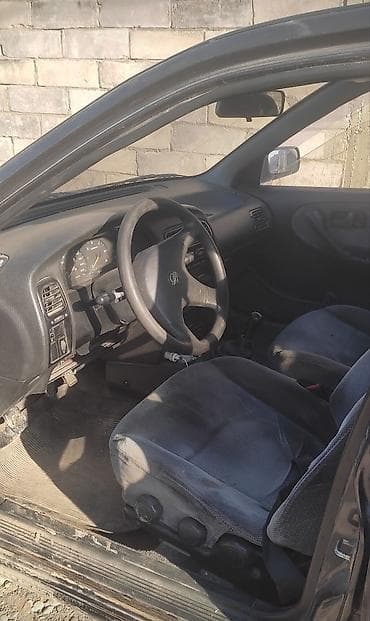 mark 1: Nissan Primera: 1992 г. — 2