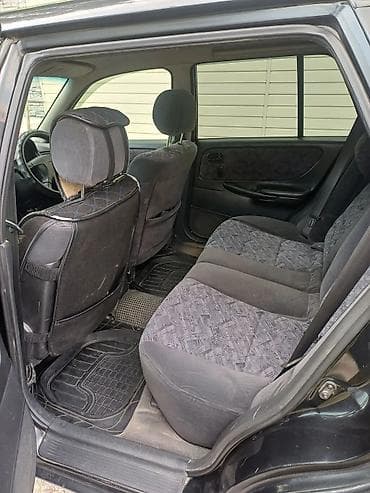 Транспорт: Mazda Capella: 1998 г., 2 л, Автомат, Универсал — 9