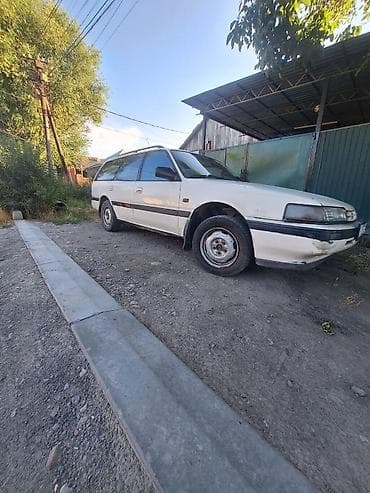 Транспорт: Mazda 626: 1993 г. — 1