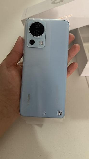 nikon d4: Xiaomi, 13 Lite, 128 ГБ, цвет - Голубой, 2 SIM — 3