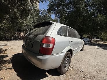 Mazda 323: 2001 г., 1.5 л, Автомат, Бензин, Универсал — 5