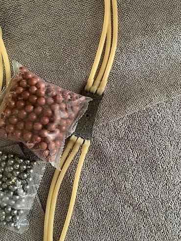 рогатка для охоты: Металическая рогатка Комплект: Сама рукоять 200шт пули из глины 100шт — 1