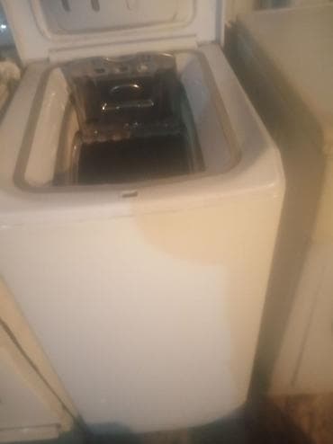 сушилка слива: Стиральная машина Indesit (вертикальная загрузка) узкая 5кг. - Тип — 4