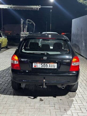 полик нексия 2: Mazda 323: 2001 г., 1.6 л, Механика, Бензиновая, Седан — 11