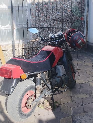 детский мопед на бензине: Мини-мотоцикл с широкими внедорожными шинами Описание: - Компактный — 2