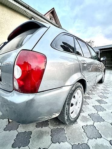 ресор масквич: Mazda 323: 2002 г., 1.6 л, Механика, Бензин, Хэтчбэк — 4