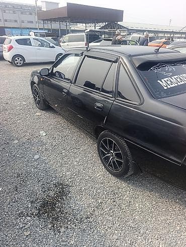 chevrolet impala: Черный седан (4 двери), передний привод. Внешний стайлинг — 4