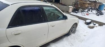 бонго мазда: Mazda Familia: 1999 г., 1.5 л, Автомат, Бензин, Седан — 4