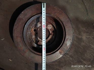 проточка тормозных дисков не снимая с машины: Задний тормозной диск Mitsubishi Б/у, Оригинал — 2