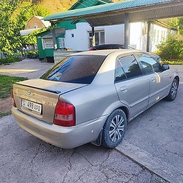 киа на продажу: Mazda Familia: 2002 г., 1.6 л, Автомат, Бензин, Седан — 2