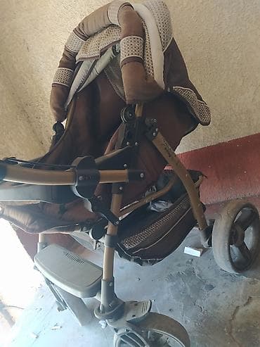 Детская коляска прогулочная, коричнево-бежевый текстиль.Адамекс