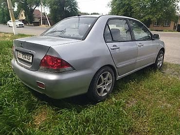 Транспорт: Mitsubishi Lancer: 2004 г., 1.6 л, Механика, Бензин, Седан — 1