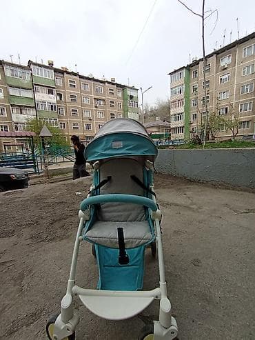 коляски прогулочный: Прогулочная коляска- трость mige (надпись на козырьке). Цвет — 2