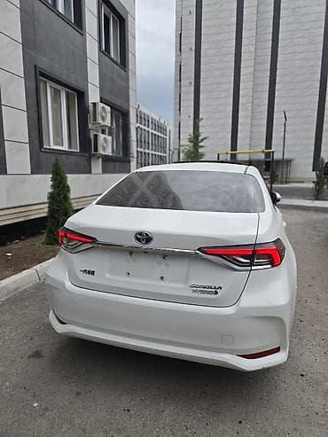 aion v plus: Toyota Corolla: 2021 г., 1.8 л, Гибрид, Седан — 4
