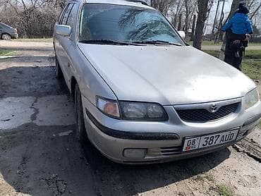 Mazda: Mazda 323: 1999 г., 1.8 л, Бензин, Универсал — 5