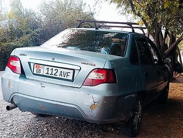 2 4 д: Daewoo Nexia: 2009 г. — 7