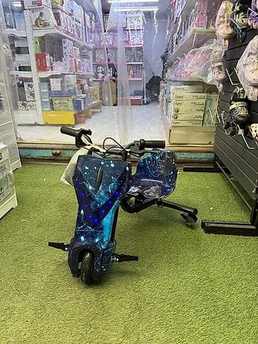 Балдардын кийим-кечелери жана бут кийимдери: Балдар электрокары — 1