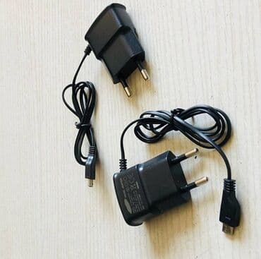 телефон зарядник: Travel Adapter micro USB, DC 5V - 0.7A (евровилка), блок питания — 1