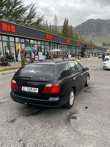 chery arizzo: Nissan Primera: 2001 г., Автомат, Бензин, Универсал — 5