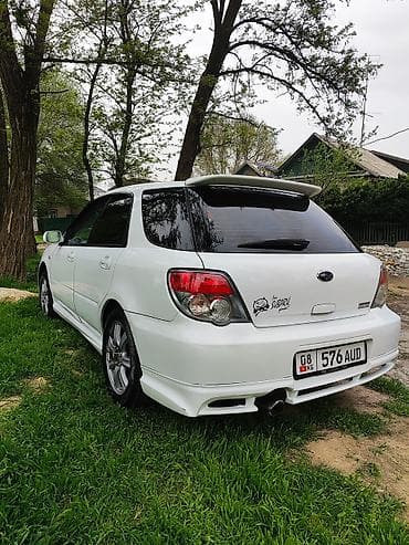 авто выхлоп: Subaru Impreza: 2005 г., 1.5 л, Автомат, Бензин, Универсал — 2