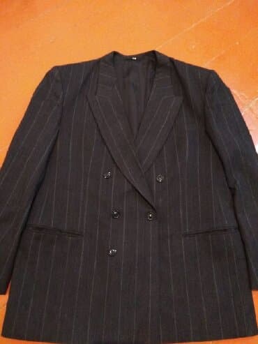 Костюм классический фирмы ROYCE двойка (пиджак+брюки) в полоску. На