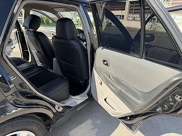 фуура даф: Mazda 323: 2002 г., 1.6 л, Механика, Бензин, Хэтчбэк — 10