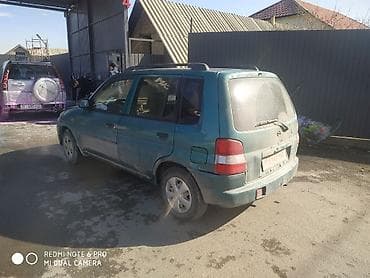 bmw e92: Mazda Demio: 1999 г. — 3