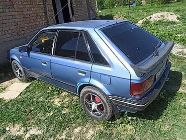 для такси авто: Mazda 323: 1985 г., 1.5 л, Механика, Бензин, Хэтчбэк — 3