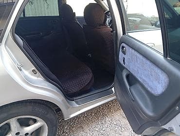 devo tiko: Mazda 626: 1998 г., 1.8 л, Механика, Бензин, Хэтчбэк — 8
