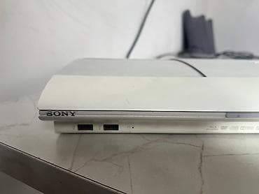 PS3 (Sony PlayStation 3): PlayStation 3 Super Slim (белая) Комплект: - Консоль PS3 Super Slim — 4