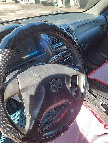 афто дом: Mazda Capella: 1998 г., Универсал — 9