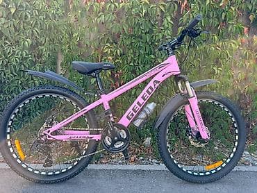 erec m8: 🚲 **Велосипед с 24 скоростями** ⚙️ **Переключатели Shimano** 🔧 — 1