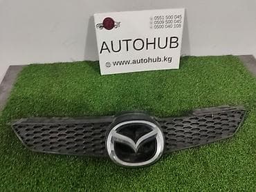 Решетки радиатора: Решетка радиатора Mazda — 1