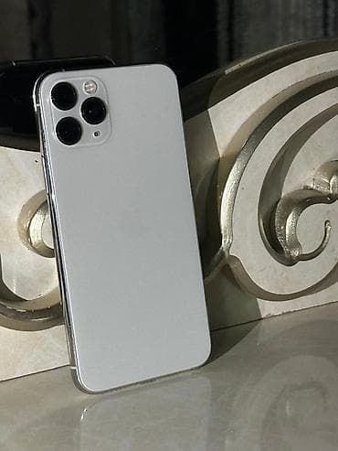 телефон айфлн: IPhone 11 Pro, Б/у, 64 ГБ, Серебристый, Зарядное устройство, Защитное стекло, Кабель, 71 % — 2