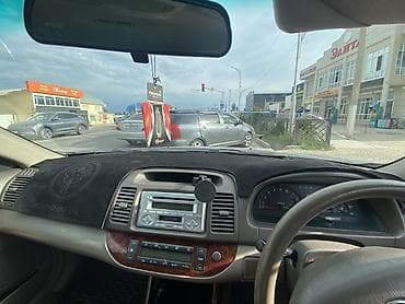на грузовое авто: Toyota Camry XV30 (правый руль) — салон, накидка на панель алькантаро — 1