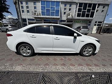 coroll: Toyota Corolla: 2022 г., 1.8 л, Вариатор, Гибрид, Седан — 3