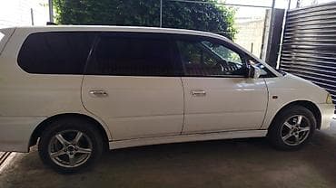 ио пинин: Honda Odyssey: 2000 г., Минивэн — 2