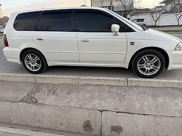 на вариант: Honda Odyssey: 2003 г., 2.3 л, Автомат, Газ, Минивэн — 2