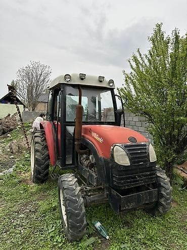 мтз 1222: Трактор с навесным оборудованием для заготовки сена Описание: - — 2