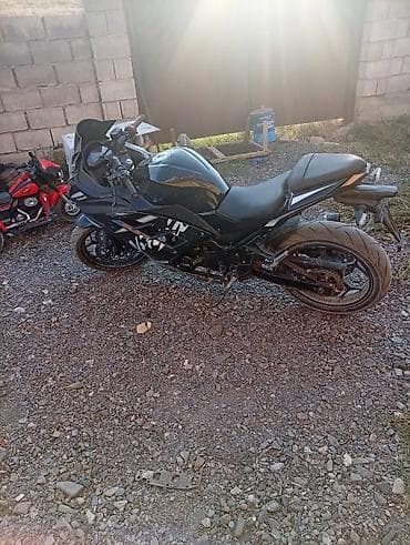 600 кубовый мотоцикл: Спортивный мотоцикл Kawasaki Ninja (чёрный) - Кузов: полностью в — 4