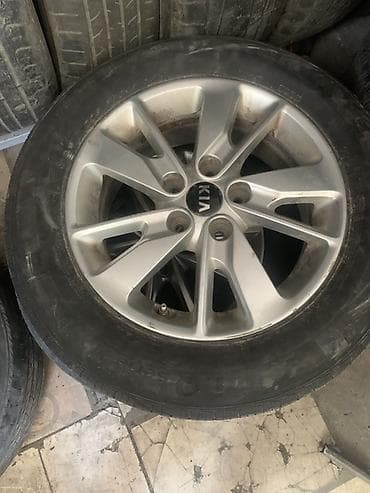 Литой диск KIA с шиной 205/65 R16 - Оригинальный литой диск KIA — 2