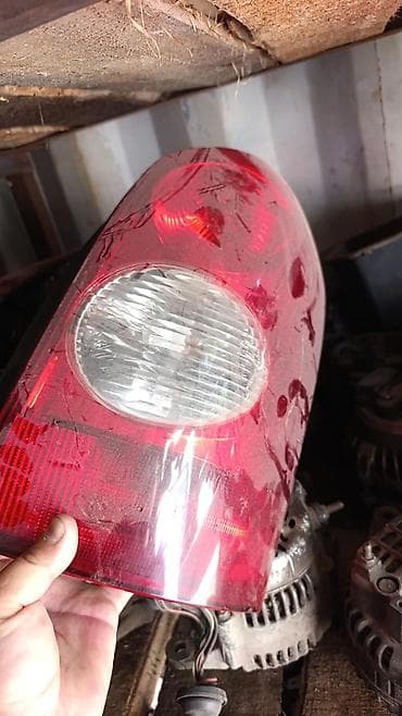 Передняя правая фара Mazda Оригинал — 2