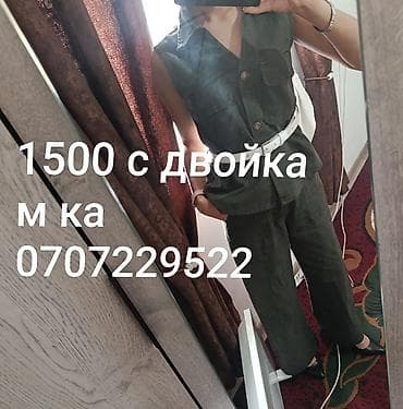Женская одежда: Женский костюм-двойка, цвет темно-зеленый (хаки). Состав комплекта: - — 1